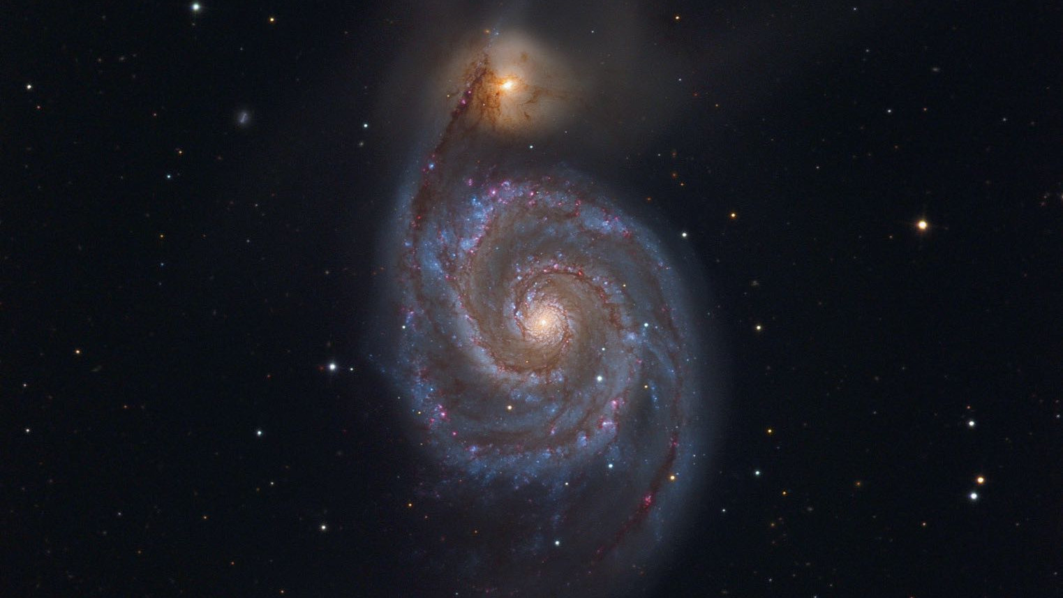 A galáxia M51 da constelação Cães de Caça é uma das galáxias mais impressionantes do céu primaveril. Johannes Schedler / CCD Guide 
