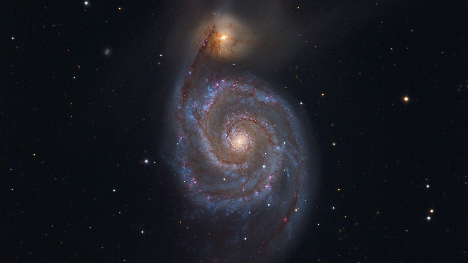 A galáxia M51 da constelação Cães de Caça é uma das galáxias mais impressionantes do céu primaveril. Johannes Schedler / CCD Guide