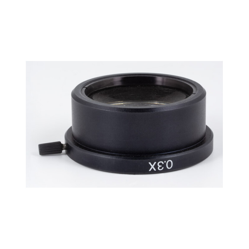 Motic 1201A: 0.3X objetivo acromático (AA=236mm)